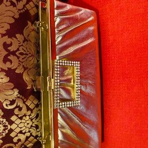 Gold clutch with rhinestone clasp